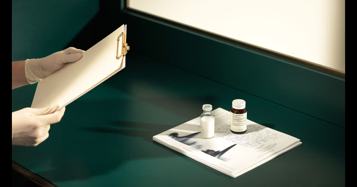 Pharmaceutical laboratory with vials and testing equipment representing peptide quality verification